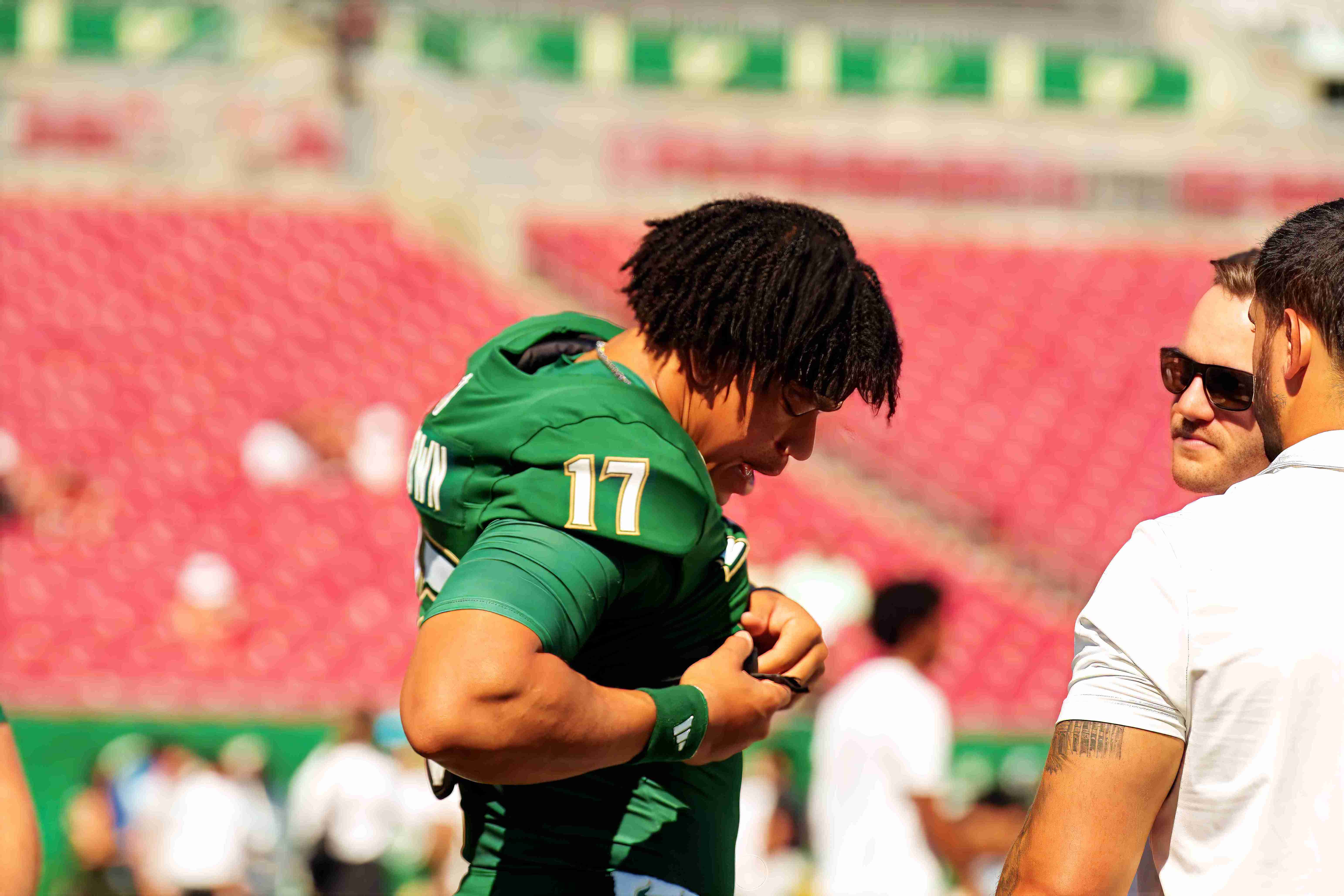 USF sideline with players and band during pre-game